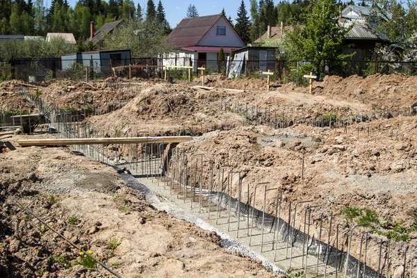 First Stage Pouring Foundation New Building Cement Reinforcements Steel Bars — стоковое изображение First Stage Pouring Foundation New Building Cement Reinforcements Steel Bars Стоковое Фото