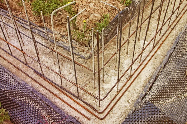 First Stage Pouring Foundation New Building Cement Reinforcements Steel Bars — стоковое изображение First Stage Pouring Foundation New Building Cement Reinforcements Steel Bars Стоковое Фото